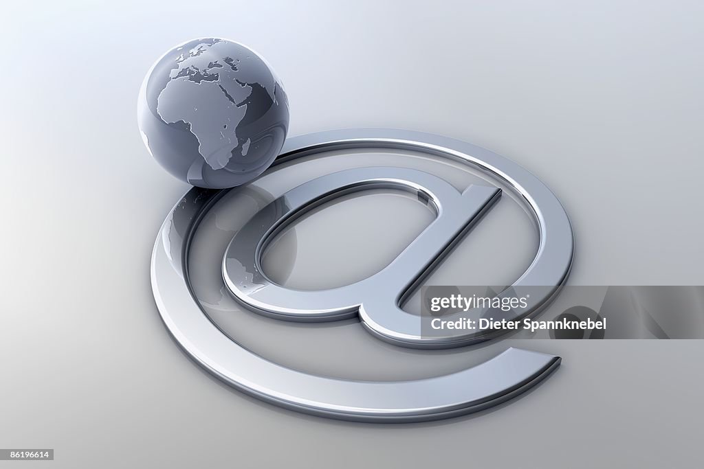 Globe orbit on an Internet 'at' symbol