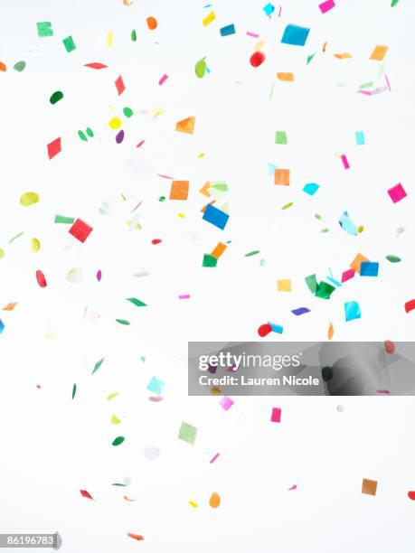 multicolored confetti on white background - 白背景　無人 ストックフォトと画像