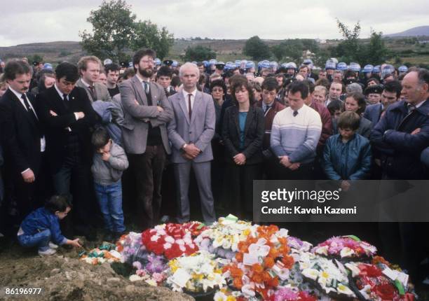 Sinn Fein leader Gerry Adams and Sinn Fein deputy leader and alleged IRA chief of staff, Martin McGuinness attend the funeral of an IRA volunteer, as...