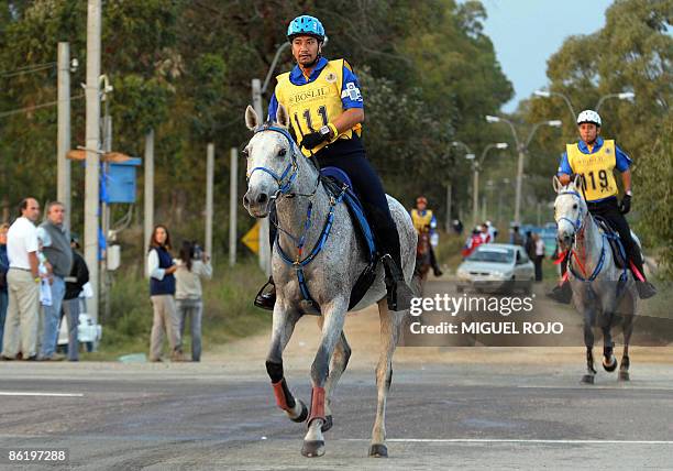 The King of Malaysia Sultan Mizan Zainal Abidin rides his horse during the Pan-American Endurance Horse ride in Costa Azul beach, 60 kilometers east...