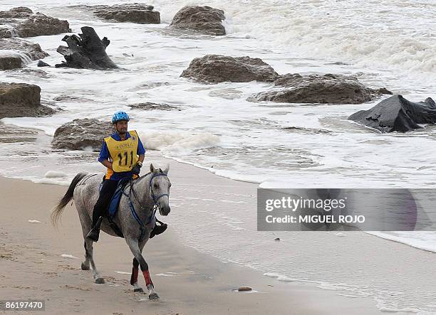 The King of Malaysia Sultan Mizan Zainal Abidin rides his horse during the Pan-American Endurance Horse ride in Costa Azul beach, 60 kilometers east...