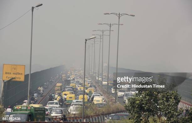 Delhi witnesses a smog-forming weather, on October 16, 2017 in New Delhi, India. There has been a sudden increase in cases due to the changing...