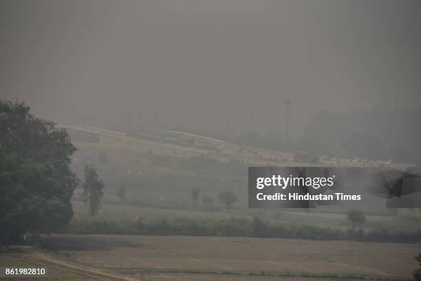 Delhi witnesses a smog-forming weather, on October 16, 2017 in New Delhi, India. There has been a sudden increase in cases due to the changing...