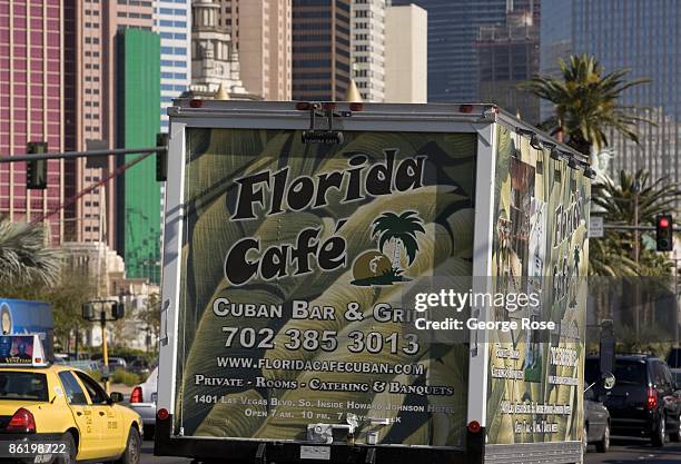 Van with a mobile billboard promoting a restaurant is seen driving down the Las Vegas Strip in this 2009 Las Vegas, Nevada, early morning street...