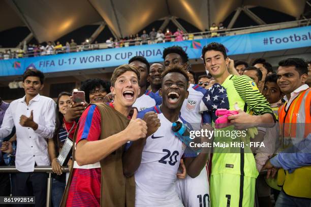 Players of USA celebrate after winning the FIFA U-17 World Cup India 2017 Round of 16 match between Paraguay and USA at Jawaharlal Nehru Stadium on...