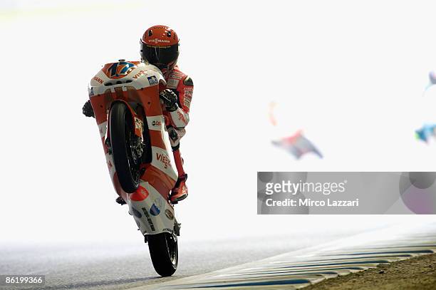 Stefan Bradl of German and Viessmann Kiefer Racing lifts the front wheel during the MotoGP of Japan practice day at Twin Ring Motegi on April 24,...