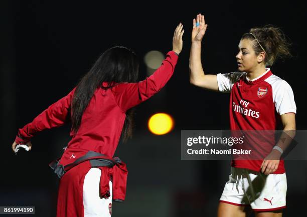 Alex Scott congratulates teammate Jemma Rose during the FA Women's Super League Continental Cup match between Arsenal and London Bees, on October 12,...