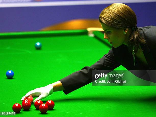 Referee Michaela Tabb lines up the balls during the 2nd Round match between Shaun Murphy and Marco Fu on April 24, 2009 at the Crucible Theatre,...