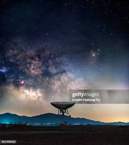 milky way above radio telescope - astronomy telescope stock pictures, royalty-free photos & images