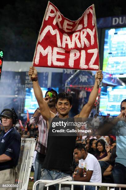 Fan of Preity Zinta gestures in the crowd during IPL T20 match between Royal Challengers Bangalore and Kings XI Punjab at SaharaStadium on April 24,...