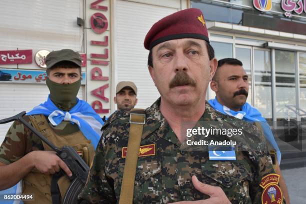 Iraqi Turkmen Front's Head of Security Department Ahmet Tahir speaks to media after Iraqi forces retake the city's control from Peshmerga forces,...