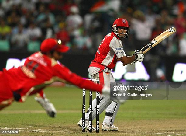 Robin Uthappa misses a catch of Ravi Bopara during the IPL T20 match between Royal Challengers Bangalore and Kings XI Punjab at SaharaStadium on...