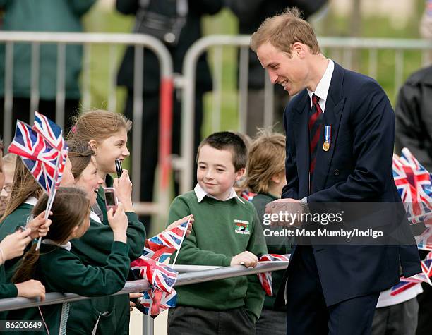 Prince William meets with school children as he visits the National Memorial Arboretum to launch the NMA Future Foundations Appeal on April 24, 2009...