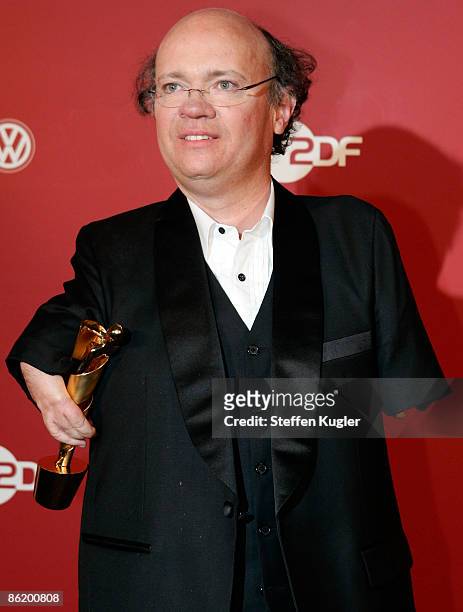 Niko von Glasow holds his LOLA for the best documentary film at the German Film Award 2009 at the Palais am Funkturm on April 24, 2009 in Berlin,...