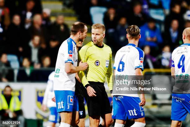 Jon Gudni Fjoluson of IFK Norrkoping and Glenn Nyberg, referee discussing during the Allsvenskan match between IFK Norrkoping and Malmo FF at...