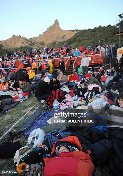 People gather for the dawn service part of the ceremony celebrating the 94th anniversary of Anzac Day in Canakkale on April 24, 2009. The dawn...