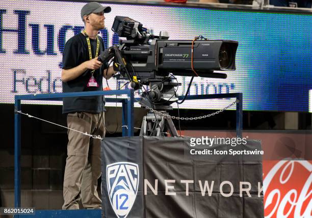 Network camera operator looks at his moinitor during the college football game between the UCLA Bruins and the Arizona Wildcats on October 14 at...