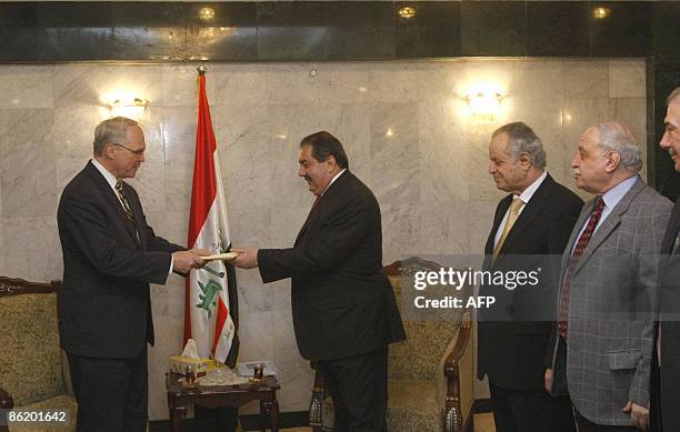 Diplomat Christopher Hill presents his credentials to Iraqi Foreign Minister Hoshyar Zebari at the Foreign Ministry in Baghdad on April 24 2009. US...