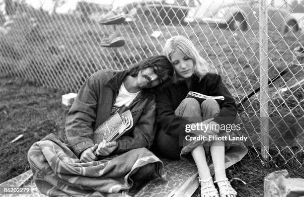 Photo of WOODSTOCK, Couple with Woodstock programs, Woodstock , Bethel, NY, 1969