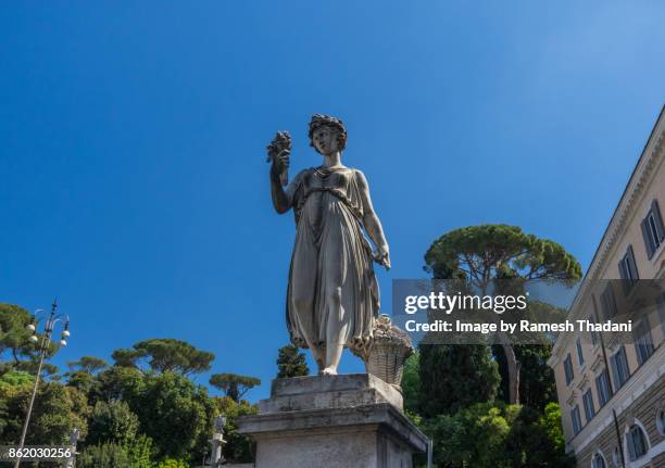 statue of the goddess abundantia (horizontal) - piazza del popolo rome stock pictures, royalty-free photos & images