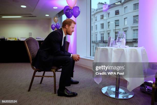 Patron of WellChild Prince Harry takes part in an internet video call with winners from Northern Ireland whose flight to attend the awards was...