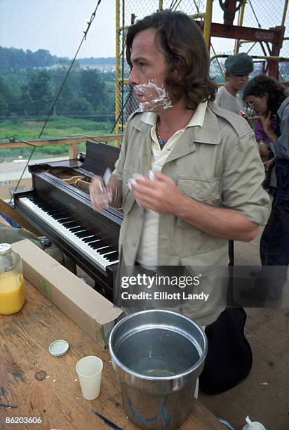 Photo of John MORRIS and WOODSTOCK, John Morris - announcer and stage manager on day two of the festival