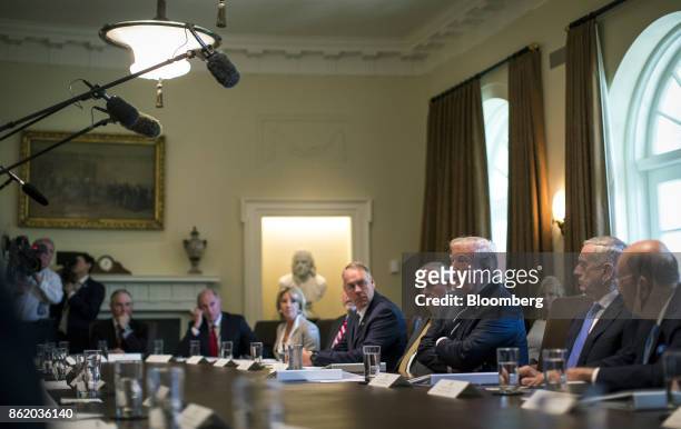 President Donald Trump, third right, speaks during a cabinet meeting at the White House in Washington, D.C., U.S., on Monday, Oct. 16, 2017. Trump...