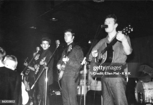 Photo of Tony SHERIDAN and BEATLES; L-R: George Harrison, John Lennon and Tony Sheridan performing live onstage during Beatles first Hamburg trip -...
