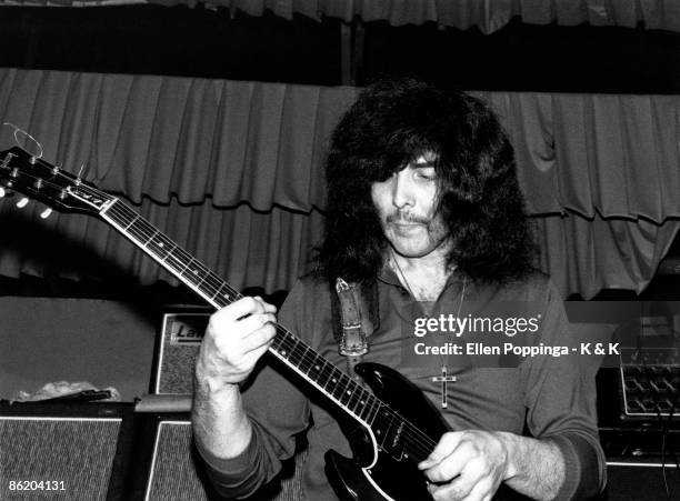 Photo of BLACK SABBATH and Tony IOMMI, Tony Iommi performing on stage as 'Earth'