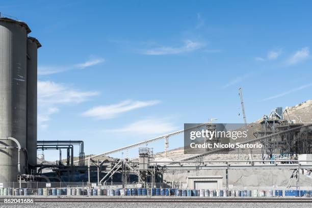 cement factory with transportation belts - tehachapi stock pictures, royalty-free photos & images