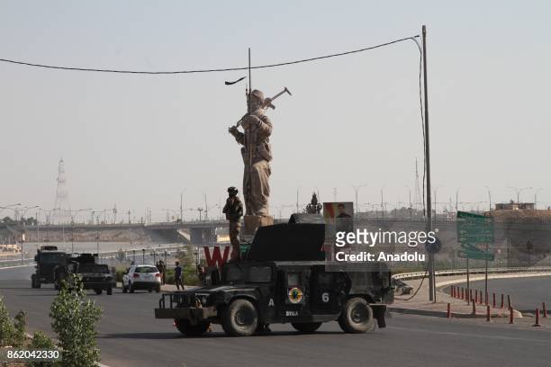 Iraqi forces patrol in the streets after they retake the control of the city center from Peshmerga forces in Kirkuk, Iraq on October 16, 2017. Iraqi...