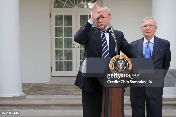 President Donald Trump and Senate Majority Leader Mitch McConnell talk to reporters in the Rose Garden following a lunch meeting at the White House...