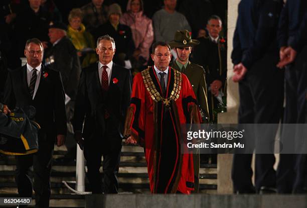 Auckland Mayor John Banks and Labour leader Phil Goff to his left lay a wreath during the Anzac day dawn service ceremony at the Auckland Museum on...