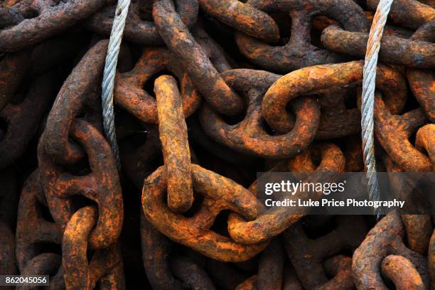 rusty chains - rusty anchor stock pictures, royalty-free photos & images