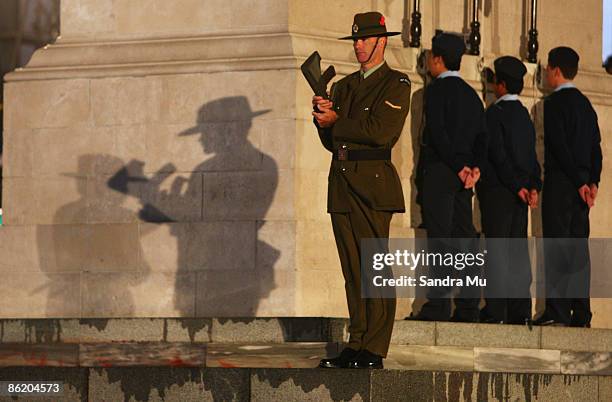 Member of the Royal New Zealand Army stands to attention at the corner of the Cenotaph during the Anzac day dawn service ceremony at the Auckland...