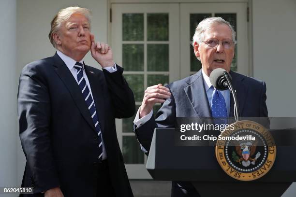 President Donald Trump and Senate Majority Leader Mitch McConnell talk to reporters in the Rose Garden following a lunch meeting at the White House...