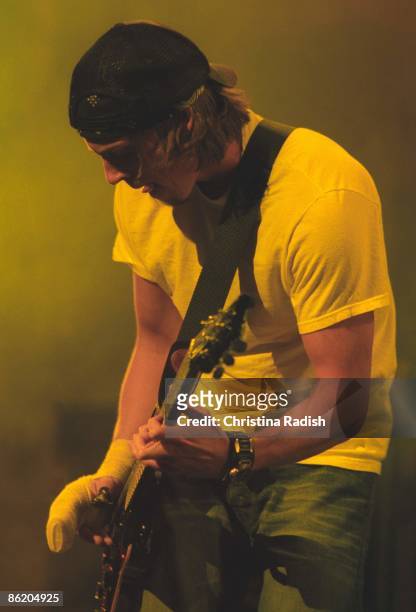 Photo of PUDDLE OF MUDD; Puddle of Mudd guitarist Paul James Phillips performing at the KROQ Almost Acoustic Christmas concert held at the Universal...