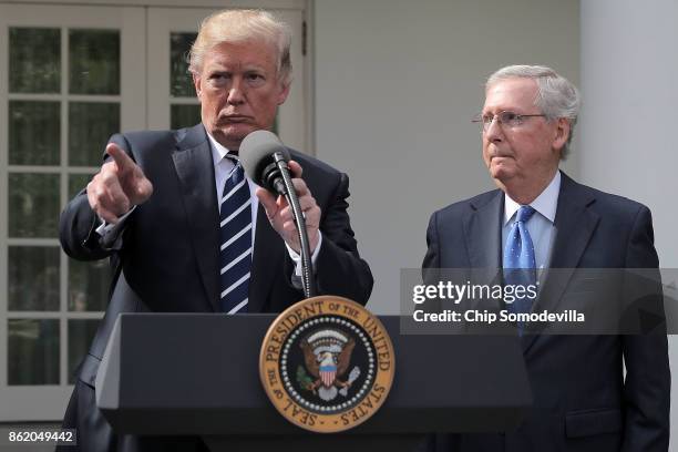 President Donald Trump calls on reporters with Senate Majority Leader Mitch McConnell in the Rose Garden following a lunch meeting at the White House...