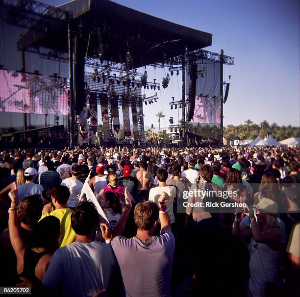 Fans take in the music at the Coachella Valley Music and Arts Festival at the Empire Polo Fields on April 18, 2009 in Indio, California. The...