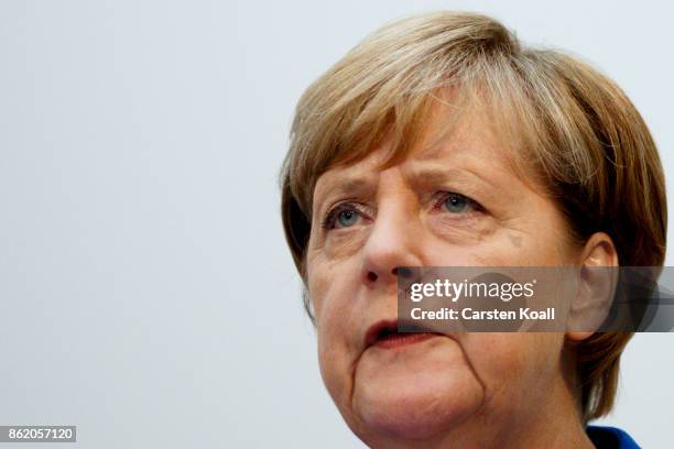 German Chancellor and leader of the German Christian Democrats Angela Merkel speaks during a press conference together with CDU lead candidate in...