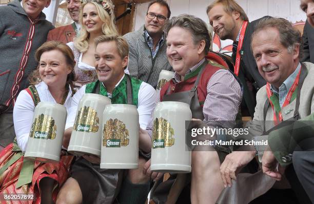 Claudia Wiesner, Hans Knauss, Michael Ludwig and Markus Liebl pose on stage during the opening of Wiener Wiesn-Fest 2017 at Kaiserwiese on September...