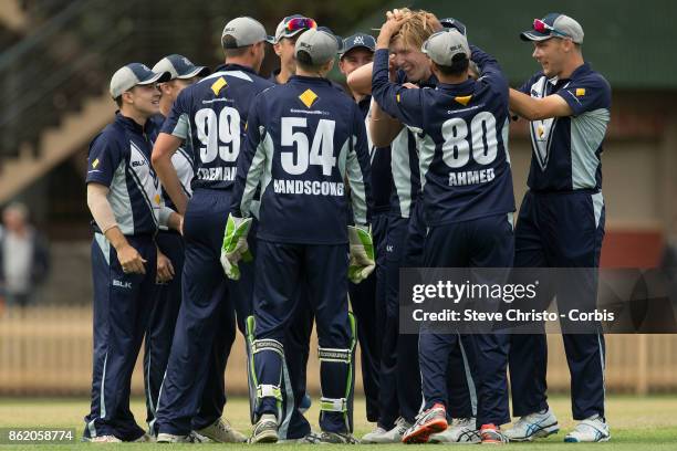 Will Sutherland of Victoria celebrates taking the wicket of Ryan Gibson of NSW during the JLT One Day Cup match between New South Wales and Victoria...