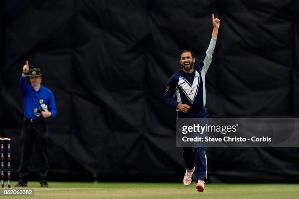 Fawad Ahmed of Victoria celebrates taking the wicket of Peter Nevill of NSW during the JLT One Day Cup match between New South Wales and Victoria at...