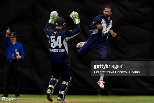 Fawad Ahmed of Victoria celebrates taking the wicket of Peter Nevill of NSW during the JLT One Day Cup match between New South Wales and Victoria at...