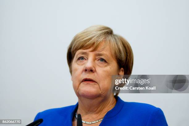 German Chancellor and leader of the German Christian Democrats Angela Merkel speaks during a press conference together with CDU lead candidate in...