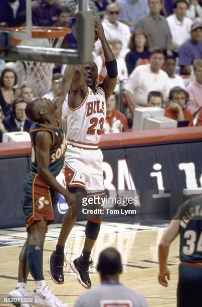 Finals: Chicago Bulls Michael Jordan in action, shooting vs Seattle SuperSonics Gary Payton at United Center. Game 6. Chicago, IL 6/16/1996 CREDIT:...