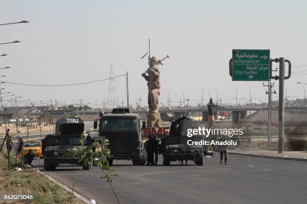 Iraqi forces patrol in the streets after they retake the control of the city center from Peshmerga forces in Kirkuk, Iraq on October 16, 2017. Iraqi...