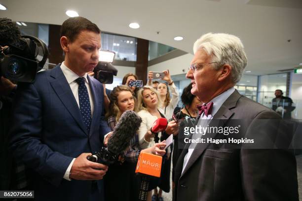 Outgoing United Future MP Peter Dunne speaks to journalist Patrick Gower during a NZ First caucus and board meeting at Parliament on October 17, 2017...