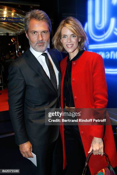 Julie Andrieu and her husband Stephane Delajoux attend the "Knock" Paris Premiere at Cinema UGC Normandie on October 16, 2017 in Paris, France.