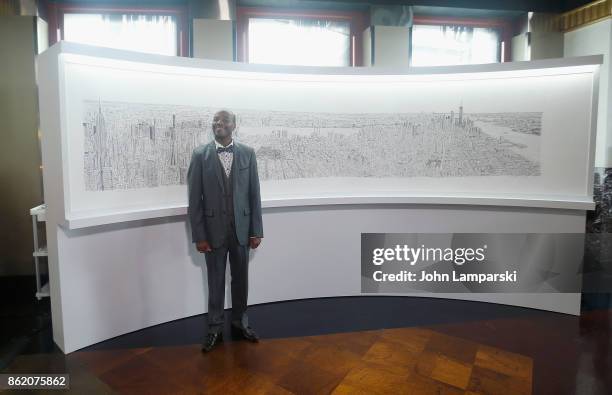 Artist Stephen Wiltshire attends Empire State Building as it unveils commissioned cityscape by artist Stephen Wiltshire at The Empire State Building...